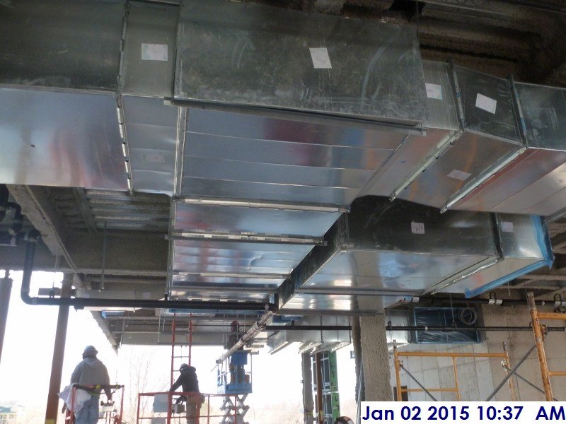 Installing duct work at the 4th floor Facing North